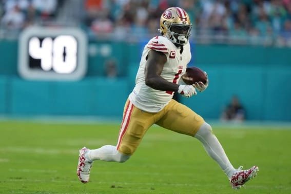 Deebo Samuel Returns to 49ers on One-Year Deal Worth Up to $7 Million, AP Source Says Deebo Samuel runs with the ball during a San Francisco 49ers NFL game
