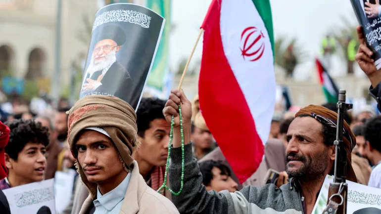 Yemen War 2026: Why New Conflict Could Be Different for Houthis Houthi supporters rally in Sanaa during escalating Yemen War 2026 tensions and renewed military conflict.