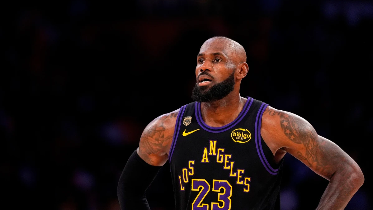 LeBron James Joins 76ers: NBA Legend Signs $8M Deal for Title Run LeBron James wearing Philadelphia 76ers jersey after signing NBA contract
