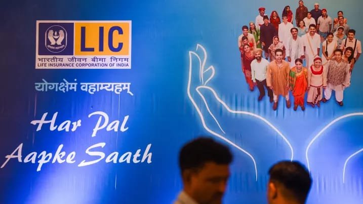 India Plans Up to $3.3 Billion LIC Stake Sale as Government Moves to Meet Public Shareholding Norms Life Insurance Corporation of India (LIC) logo displayed during the government's stake sale announcement.