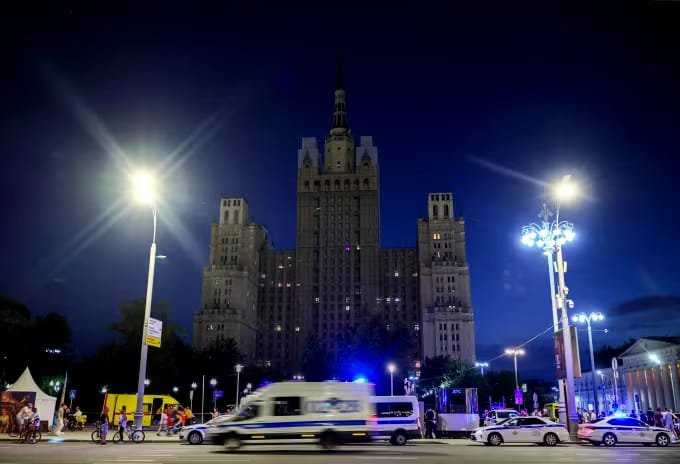 Emergency responders and police at the scene of the deadly bomb explosion outside Balzi Rossi restaurant in Moscow.