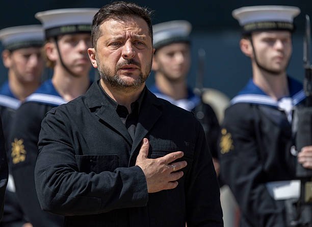 Russia Launches Deadly Missile and Drone Attack on Ukraine as Zelensky Urges More Patriot Air Defenses Emergency responders work at the site of a Russian missile strike in Kyiv as Ukraine seeks additional Patriot air defense systems.