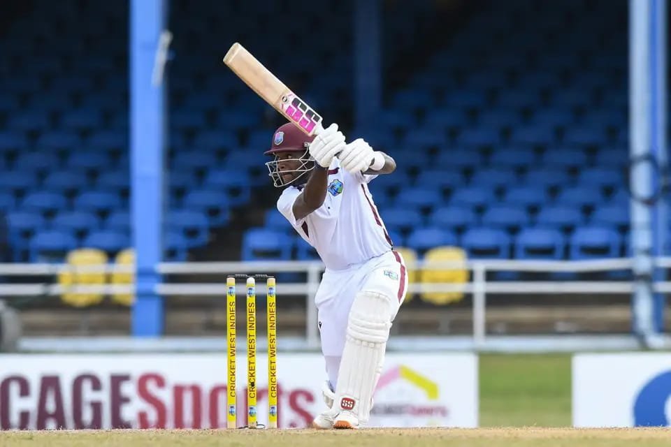 West Indies vs Pakistan 2nd Test: West Indies Reach 239/5 on Rain-Hit Day 1 as Justin Greaves Leads Fightback Against Pakistan in 2nd Test Justin Greaves plays a shot during Day 1 of the West Indies vs Pakistan second Test at Queen's Park Oval.