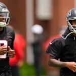 Tua Tagovailoa and Michael Penix Jr. during an Atlanta Falcons practice