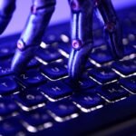 AI agent security breach showing a robotic hand and computer keyboard