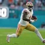 Deebo Samuel runs with the ball during a San Francisco 49ers NFL game