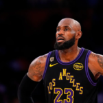 LeBron James wearing Philadelphia 76ers jersey after signing NBA contract