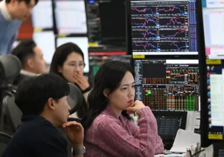South Korea stock market traders monitor markets during a volatile Kospi session