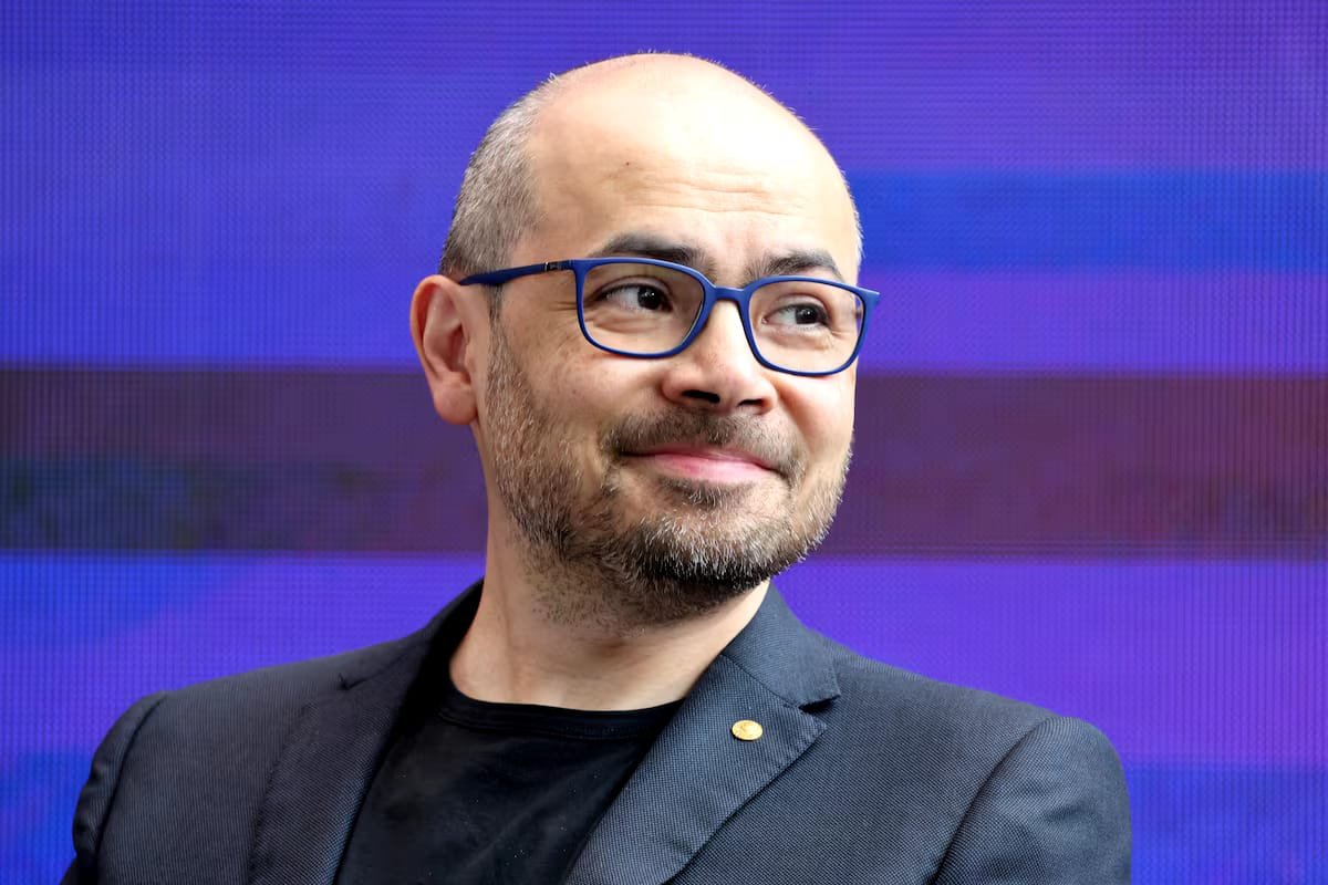  Demis Hassabis speaking at an artificial intelligence summit after Alphabet announced major AI leadership changes.