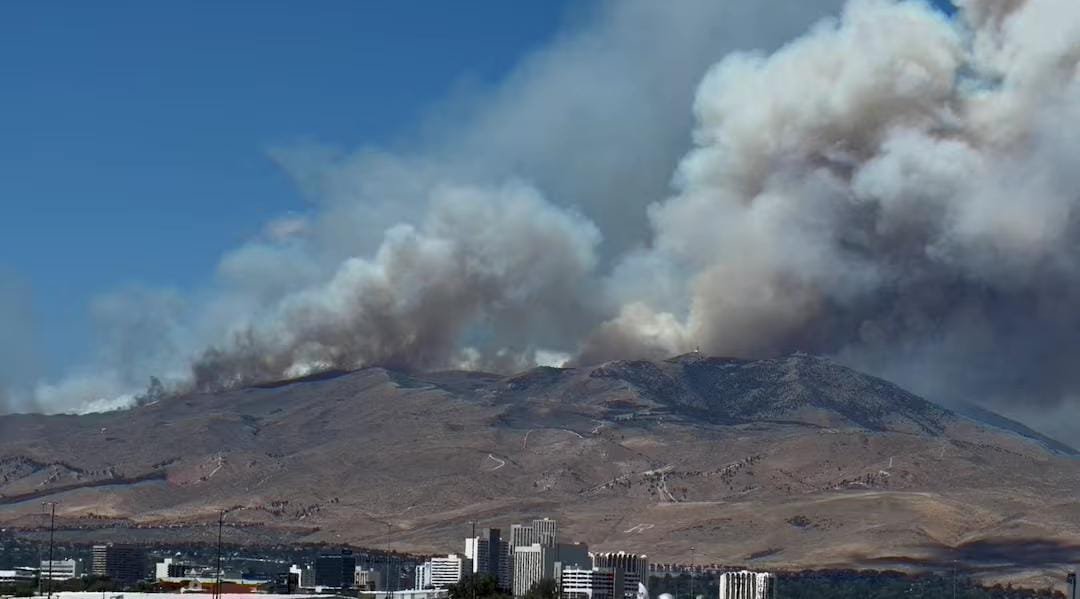 Smoke rises from hills as the Hawk Fire burns in Washoe County near Reno, Nevada
