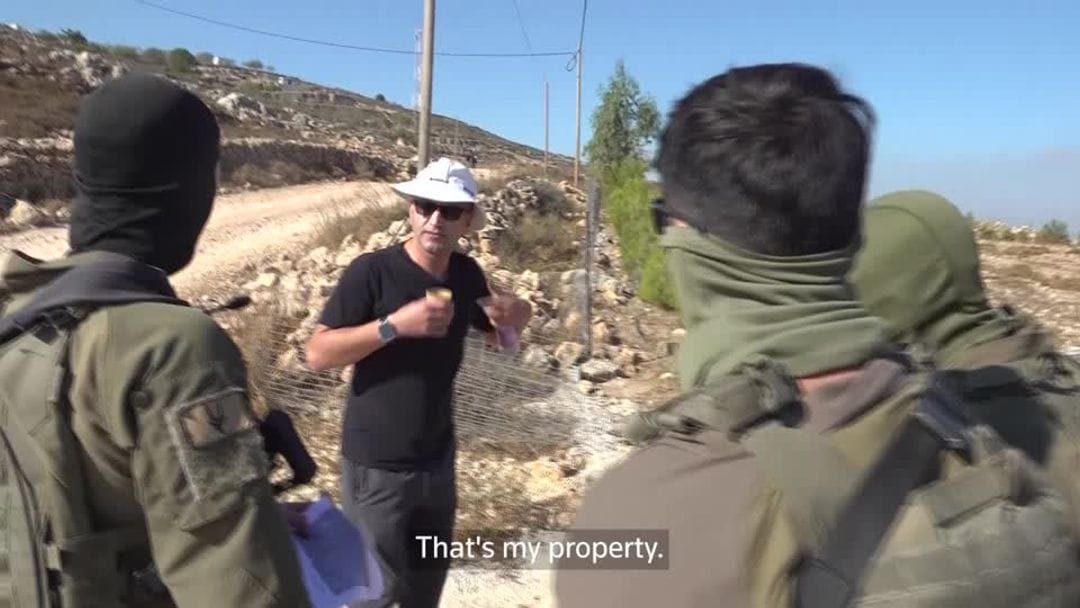 Palestinian American Loui Ridi confronts Israeli settler at his West Bank home