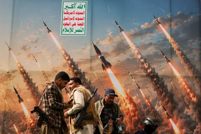 Houthi supporters gather in Sanaa as tensions escalate following missile and drone attacks on Yemeni government forces.