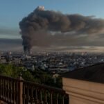 Destroyed vehicle after a Russian air attack in Kyiv amid US sanctions debate