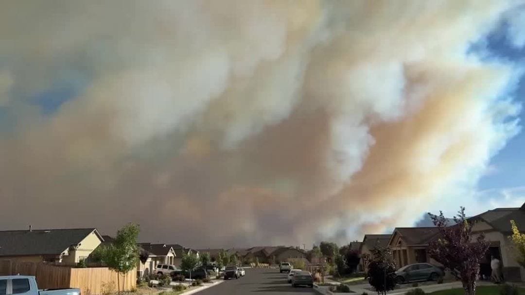 Smoke rises from hills as the Hawk Fire burns in Washoe County near Reno, Nevada