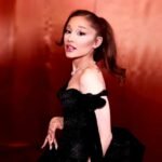 Ariana Grande performs during the Eternal Sunshine Tour while addressing fans about her planned break from public visibility.