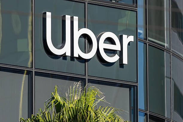 Uber Forecast Disappoints Investors Despite Solid Q2 Results as Shares Slip Uber logo representing the company's Q2 2026 earnings results and third-quarter business outlook.