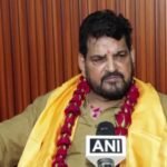 Former WFI chief Brij Bhushan Sharan Singh reacts after the Delhi court acquitted him in the women wrestlers' sexual harassment case.