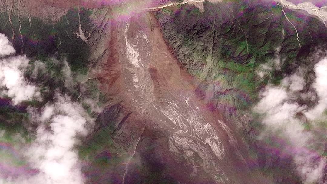 Nepal Flash Flood May Be Linked to Glacier Collapse * Nepal flash flood aftermath near the Nepal-China border showing debris and sediment after a possible glacier collapse