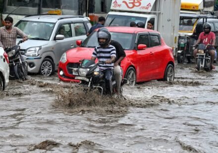 Waterlogged road in Delhi after heavy rainfall caused traffic congestion across NCR.