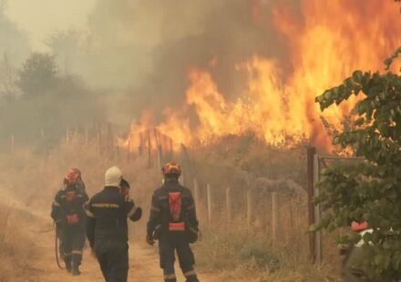 Firefighters battle a massive wildfire in Greece after two firefighting helicopters collided during operations.