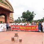 Opposition leaders protest in Parliament demanding Amit Shah's statement on the July 20 student police action.