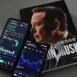 Elon Musk speaks during a SpaceX press conference as the company approaches its first post-IPO share lockup expiry.