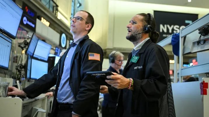 6 Investors Flag Market Risks, But Agree on One Strategy Market risks for investors as traders work on the New York Stock Exchange