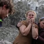 Rescue teams inspect damage after a Russian missile strike in Ukraine during intensified attacks in July 2026.