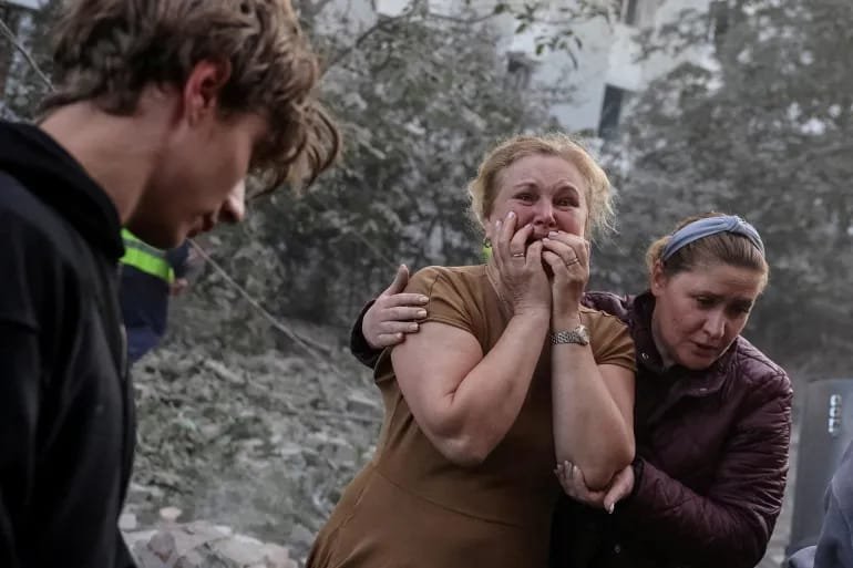 Rescue teams inspect damage after a Russian missile strike in Ukraine during intensified attacks in July 2026.