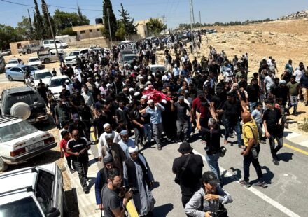 Mourners carry the body of Palestinian activist Owdeh Hathaleen during his funeral near Hebron in the occupied West Bank.