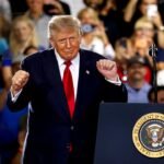 President Donald Trump during an economic event as Reuters/Ipsos poll shows Democrats leading on economic trust